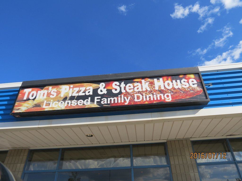 Tom`s Pizza & Steakhouse